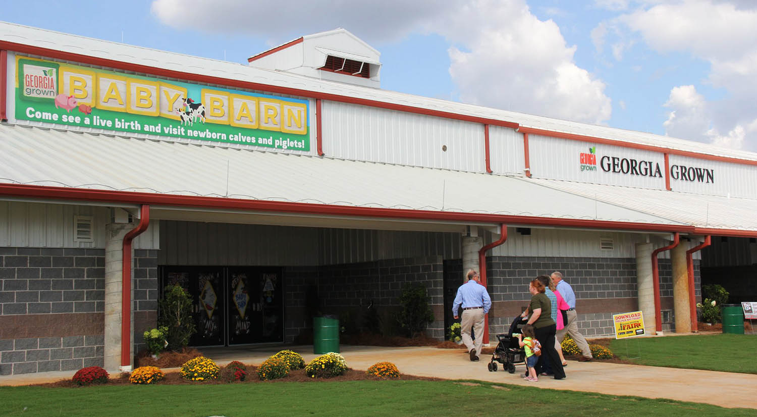 Fair attendees enter the Georgia Grown Baby Barn